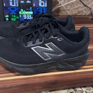 New Balance Black Athletic Shoes with Silver N Logo